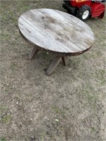 Nice round cedar outdoor table, measures 27