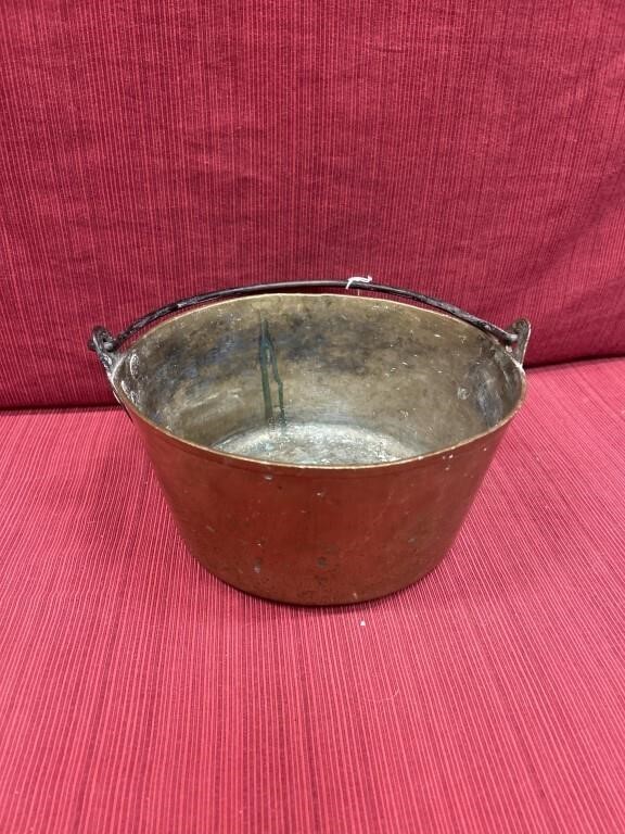 Hammered brass bucket with iron bell handle