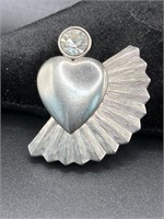 Silver tone brooch pin