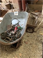 Wheel barrow with contents, lawn seeder