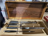 Stainless knife set in wooden box