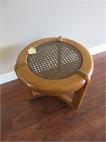 A Contemporary Side Table With Caned Top