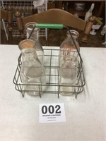 Milk bottles with carrier