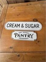 Metal cream and sugar sign and other metal sign