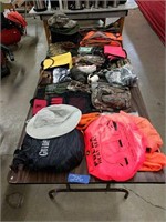 Table Lot Of Hunting Clothing As Shown