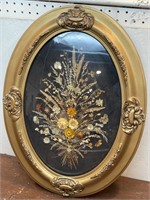 Bow glass frame with dried floral