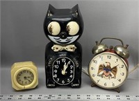Jeweled kit cat clock eagle alarm clock and