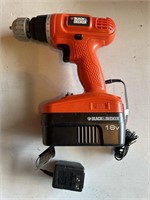 Black & Decker 16 V power drill with charger