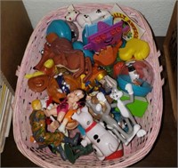 Plastic Toys In Pink Basket