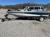 14 FT. FREE TIME BOAT W/140 EVINRUDE AND TRAILER