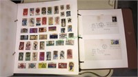 Stamp collection including a binder first day