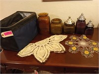 5 glass canisters, three lids, doilies, portable