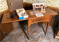 SINGER 401A sewing machine in cabinet- good cond.
