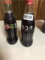 Coke - 2 bottles. Look at pics