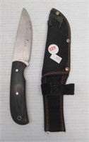 Fixed blade knife with wood handle and sheath.