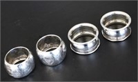 FOUR STERLING SILVER NAPKIN RINGS