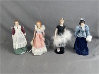 4 Small Porcelin Dolls