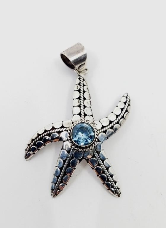 Sterling Silver Sea Star Pendant set with a stone