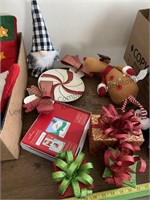 Box of Christmas items including hallmark photo