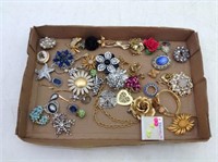 Flat of Costume Jewelry  Mostly Broaches & Rings