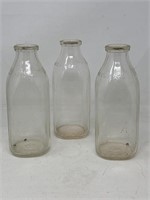 -3 universal MBS Inc. milk bottles and three