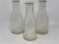 -3 1 quart milk bottles and three milk bottle