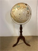 Globe on wood stand. 36” tall.