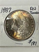 1887 Morgan Dollar - AU (TONED)