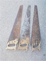 Three vintage saws one is a disston