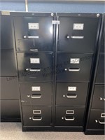 Two metal filing cabinets all drawers work