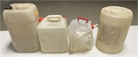 4 plastic water jugs