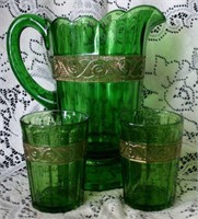 Green pitcher with gold  and 2 matching glasses