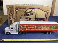 Ertl white GMC cab with trailer, 1/64 scale, in