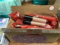 Box of Revlon Snow Pink lip gloss