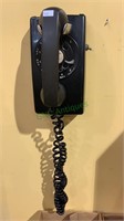 Vintage rotary wall phone by Western