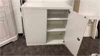 Metal shelving unit with doors