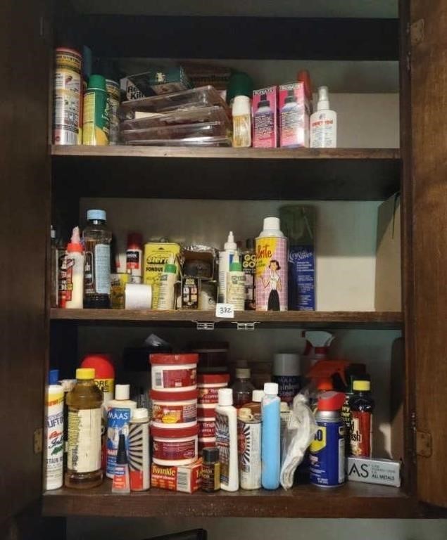 Cabinet contents, 2 shelves of cleaning supplies,