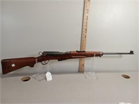 Swiss 7.5mm Swiss rifle. Note the ammo on the