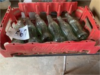 6 Coca-Cola Bottles and Crate