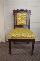Antique carved, upholstered side chair, front