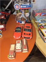 Baseball figurine, toy cars