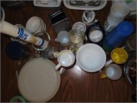 Assortment of cups, plates, and Pyrex measuring