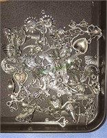 Group of Silvertone charms including cars,