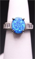 Oval cut blue opal ring, lab grown