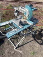 Makita 10" sliding compound mitre saw on stand,