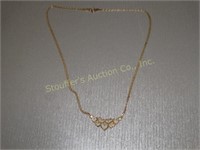 10kt Gold Necklace 15"L lots of love hearts .15