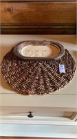 Braided mat with candle. 15 inches