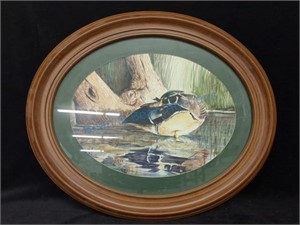 Duck painting and oval frame