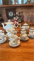 2 miniature vintage children’s doll tea-sets,