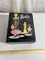 1962 Barbie case with clothes and one Barbie